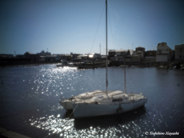 Sail boats with reflection of sunlight